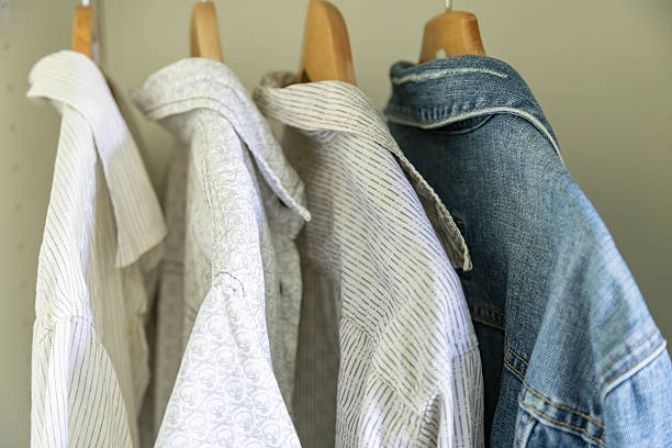 Spring clothes hanging in the wardrobe