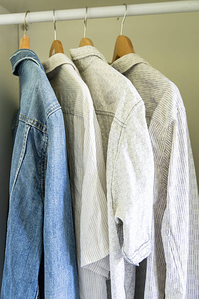 istock Clothes hanging in the wardrobe 2218738781