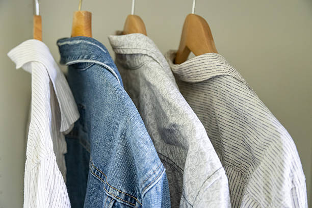 istock Clothes hanging in the wardrobe 2218738783