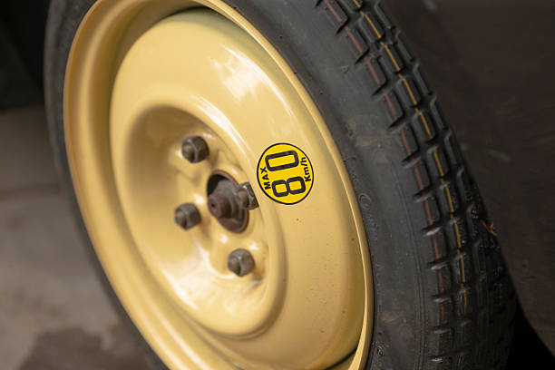 istock A Classic Vintage Car Wheel Featuring a Distinct Yellow Number Sticker 2218741894