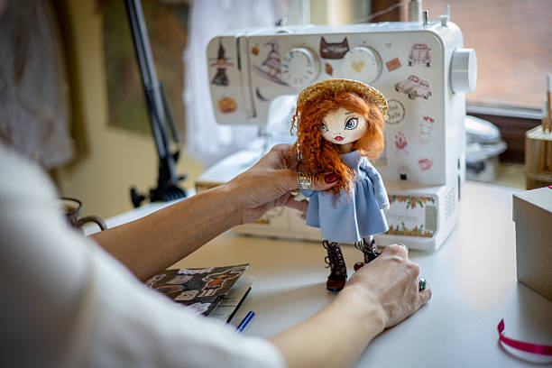 istock A female designer and artisan creating unique handmade dolls from scratch in her creative studio 2218742069