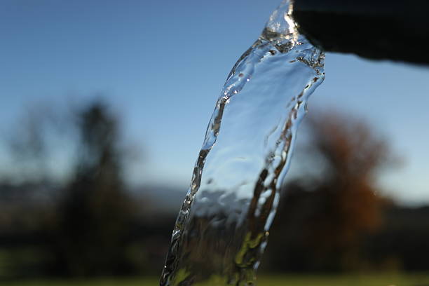 istock Stream of water is flowing from a pipe 2218746997
