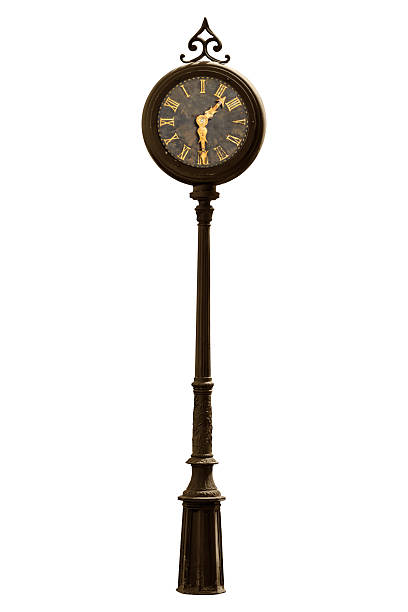 Old weathered standing street clock isolated on a white background
