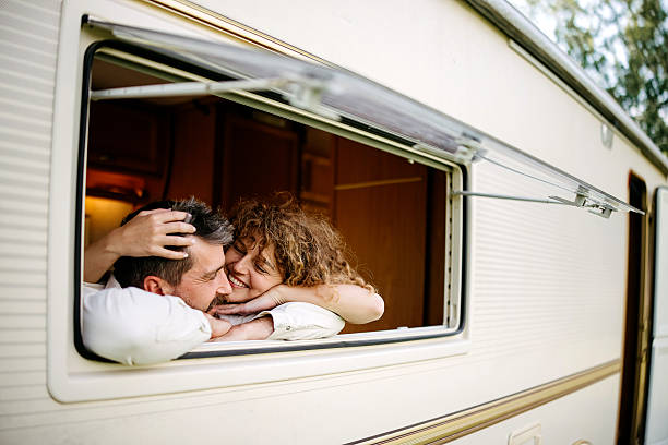 istock Young couple travels in a camper 2218751710