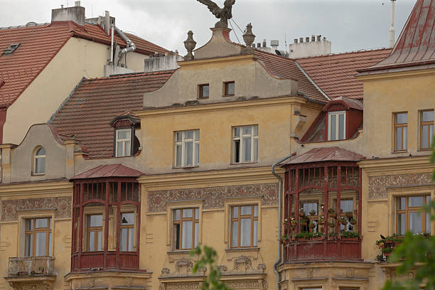 Neat row of old fashioned two or three-story buildings in historical part of Ljubljana