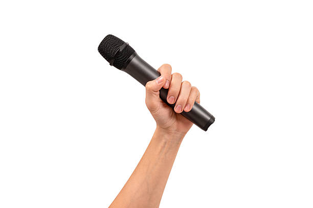 Cropped Hand Of Musician Holding Microphone