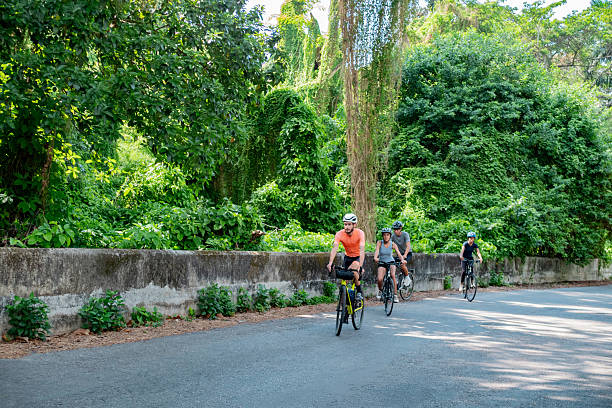 istock Young cyclists riding bicycles outdoors 2218754655