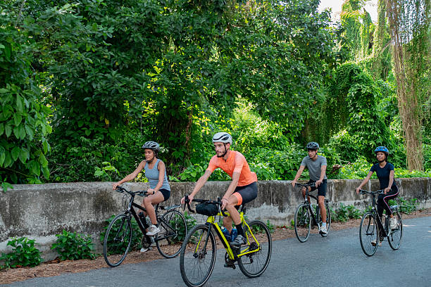 istock Young cyclists riding bicycles outdoors 2218754681