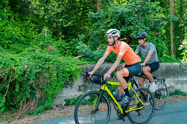 istock Young cyclists riding bicycles outdoors 2218754809