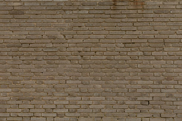 istock A Brown Brick Wall Texture Perfect for Various Background Uses and Design 2218755795