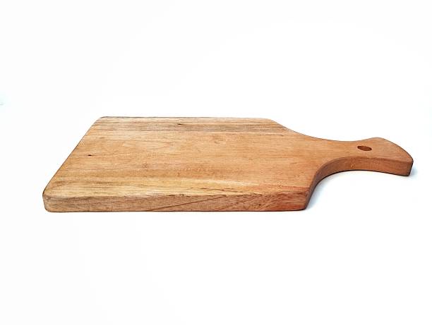 istock Wooden cutting board isolated on white background 2218761382