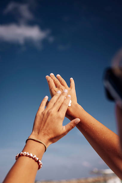 istock Applying Sun Cream on Tanned Skin 2218762509