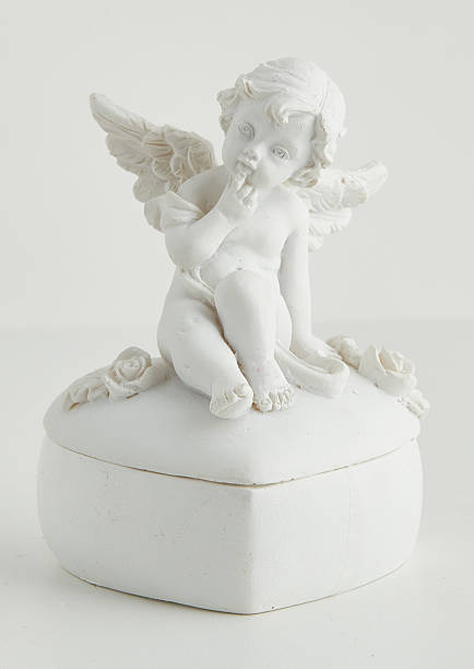istock Christmas angel winged plaster sculpture isolated nature background with clipping path 2218764219