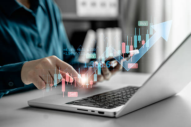 istock Businessman using laptop to analyze stock market data and financial graph with digital charts, investment growth indicators, and trading analytics for business planning, financial strategy development 2218767568