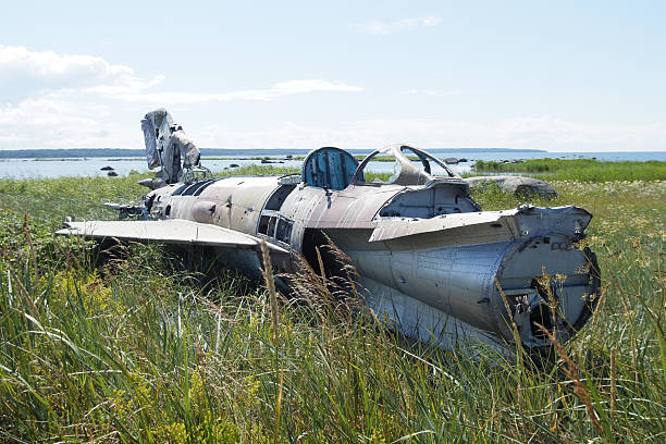 istock war plane crashed on shore of sea several years ago and lies on dunes 2218768024
