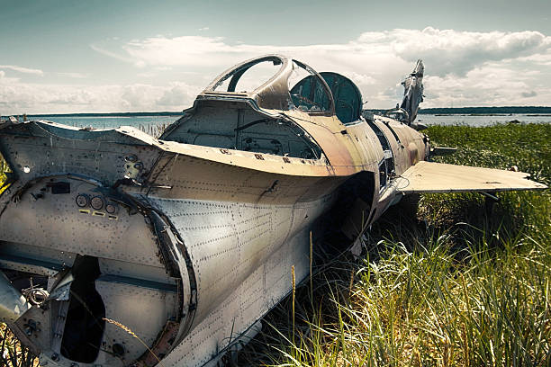 istock war plane crashed on shore of sea several years ago and lies on dunes 2218768155