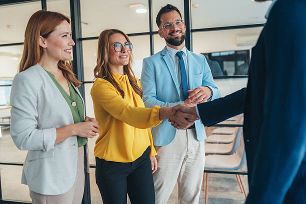 istock Business people shaking hands in the office 2218769431