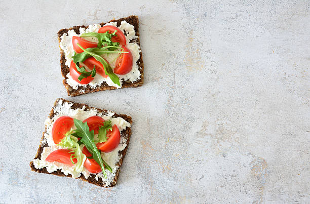istock Delicious Bruschetta with Fresh Tomatoes and Arugula copy space 2218771253