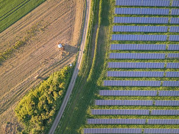 istock Aerial View of Solar Panels and Field 2218771981