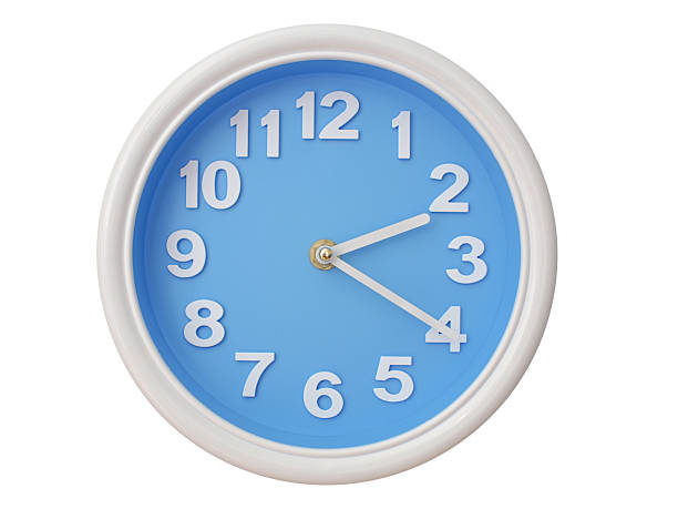 Wall clock with a blue face and white frame showing exactly 02:20 or 14:20. Represents time, deadlines.