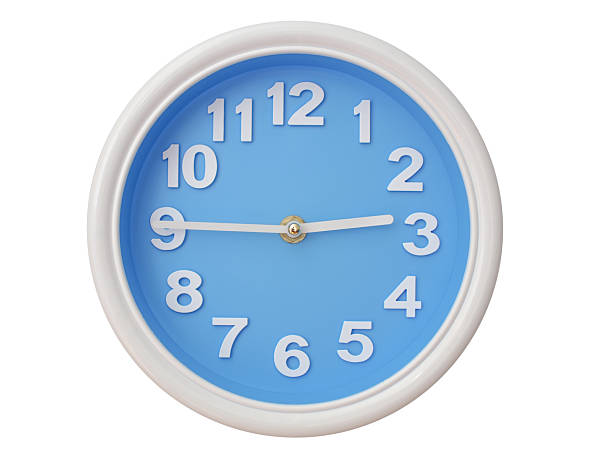 Wall clock with a blue face and white frame showing exactly 02:45 or 14:45. Represents time, deadlines.