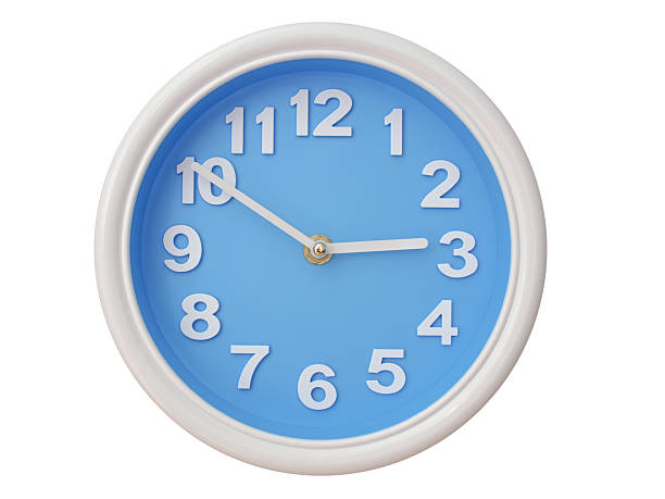 Wall clock with a blue face and white frame showing exactly 02:50 or 14:50. Represents time, deadlines.