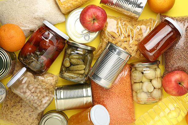 istock Food donation. Different products on yellow background, top view 2218777727