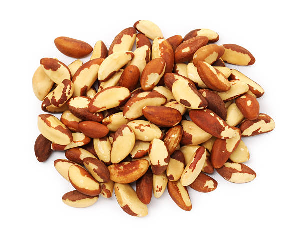 istock Heap of Brazil nuts isolated on white, top view 2218779213