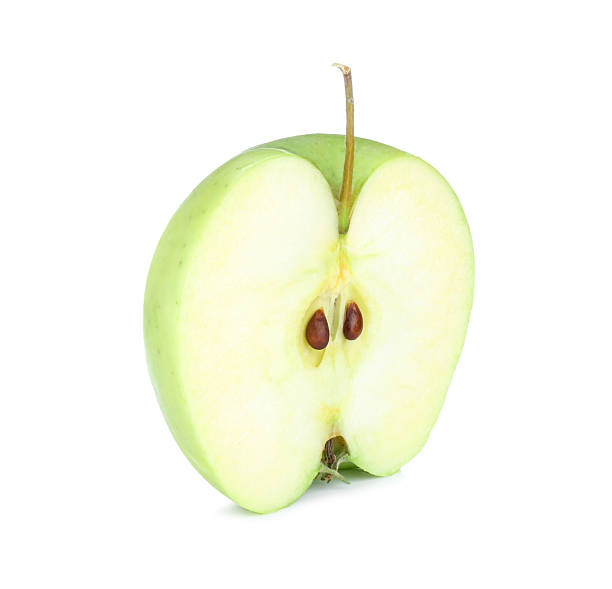 istock Half of fresh green apple isolated on white 2218780915