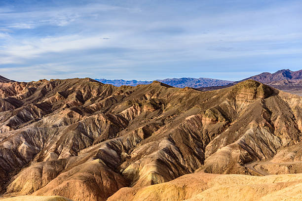 The colorful landscape seen at Zabriskie  Point extends several miles to the southeast.  These spectacular multi-colored \