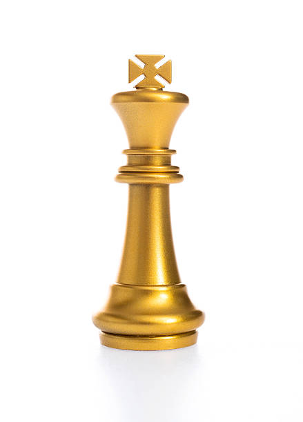 Golden king chess piece on white background.