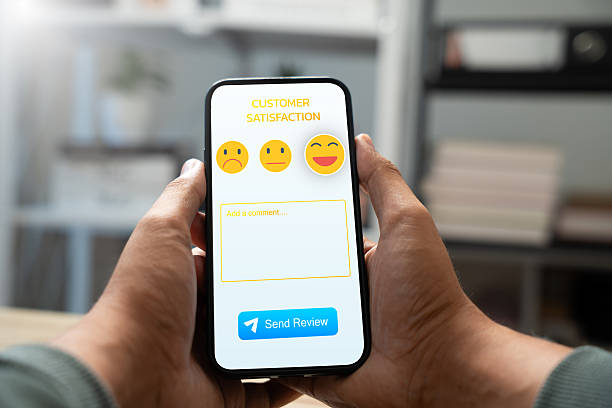 istock Experience excellent customer service, User give five star rating on online application, Positive feedback, Happy, Smiley face icon. Customer Reviews in Digital Survey, Satisfaction. 2218785343