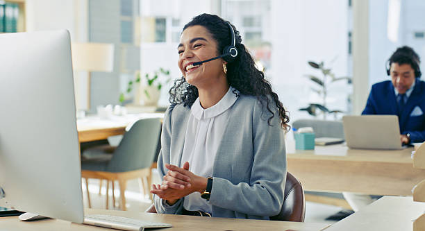istock Smiling Customer Service Professional Engaging in Office Environment 2218785772