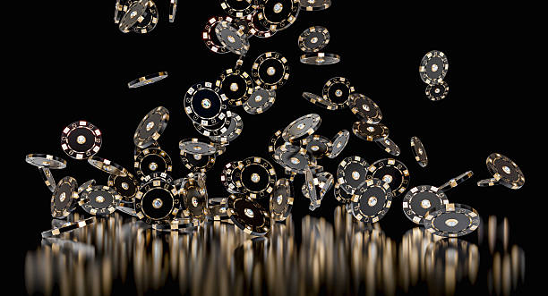 istock Casino chips with diamonds falling on a black background 2218787287