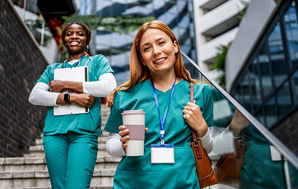 istock Nurses walking down hospital stairs during coffee break 2218791088