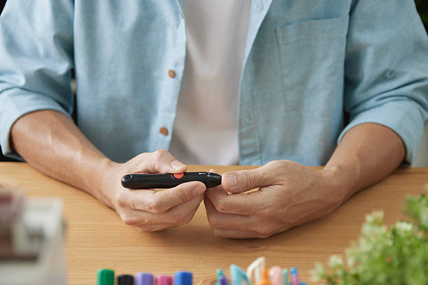 istock Front View Blood Sugar or Glucose Testing or Examining for Diabetes Symptom and Health Monitoring 2218794134