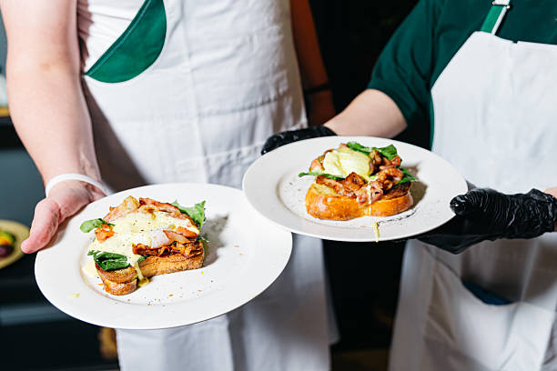 istock Chefs Presenting Gourmet Egg and Bacon Toast. 2218795932