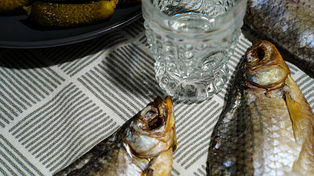 istock Traditional Russian Snack with Pickles, Dried Fish, and Vodka 2218800071