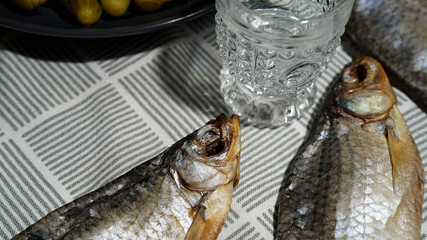 istock Traditional Russian Snack with Pickles, Dried Fish, and Vodka 2218800097