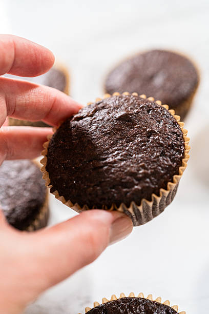 istock Baking Chocolate Cupcakes with Decadent Chocolate Frosting 2218802078