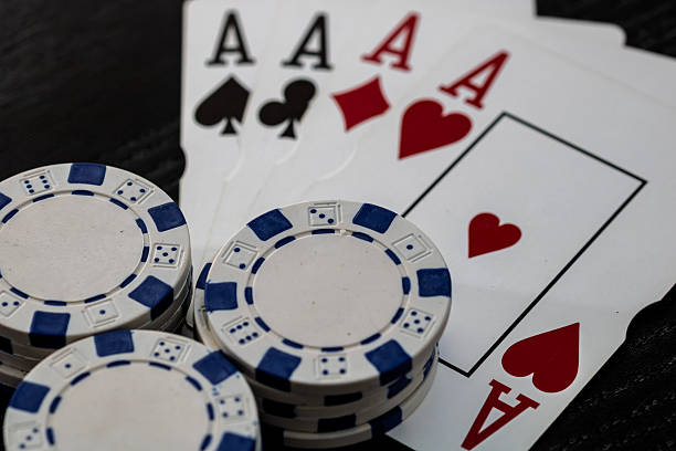 istock Casino chips and cards on the table. Poker gambling concept 2218804042