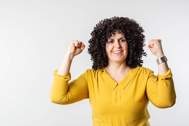 istock Surprised amazing woman isolated on white background 2218809546