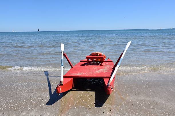 Life buoy on coastal railing at Teignmouth, Devon, UK