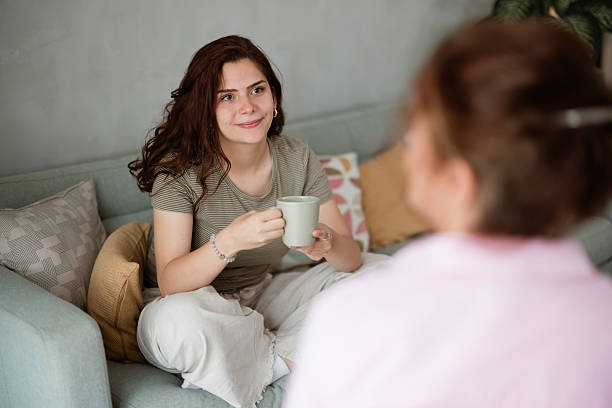 istock Mother and daughter enjoy conversation and coffee 2218816120