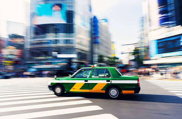 istock Speeding Green Cab in Tokyo 2218828931