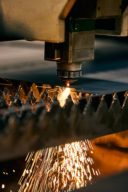 istock Precision Laser Engraving Machine in Action with Bright Sparks Displayed 2218829699