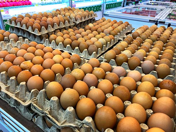 eggs in cartons are displayed in a store