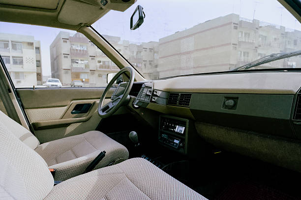 The front interior of a 1984 Citroen BX 16 TRS. The car was designed by Marcello Gandini of Bertone. This image was originally shot on film, and the negative was scanned to obtain this image.