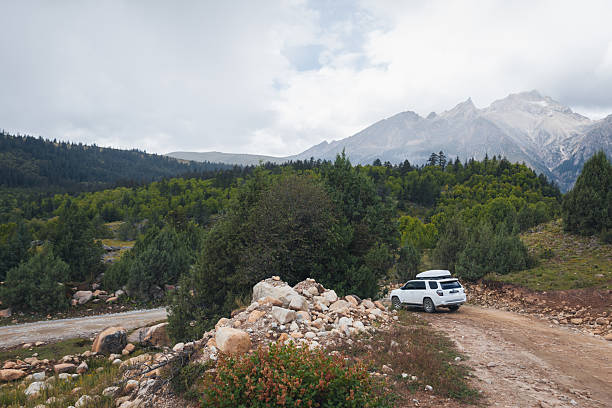 istock Driving off road car on the high altitude mountains 2218843127