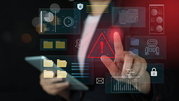 istock Security on the internet and online scam.Warning alert icon with a hacked system. malicious software, virus, spyware, malware, or cyberattacks on computer networks.Digital data is being compromised. 2218852543